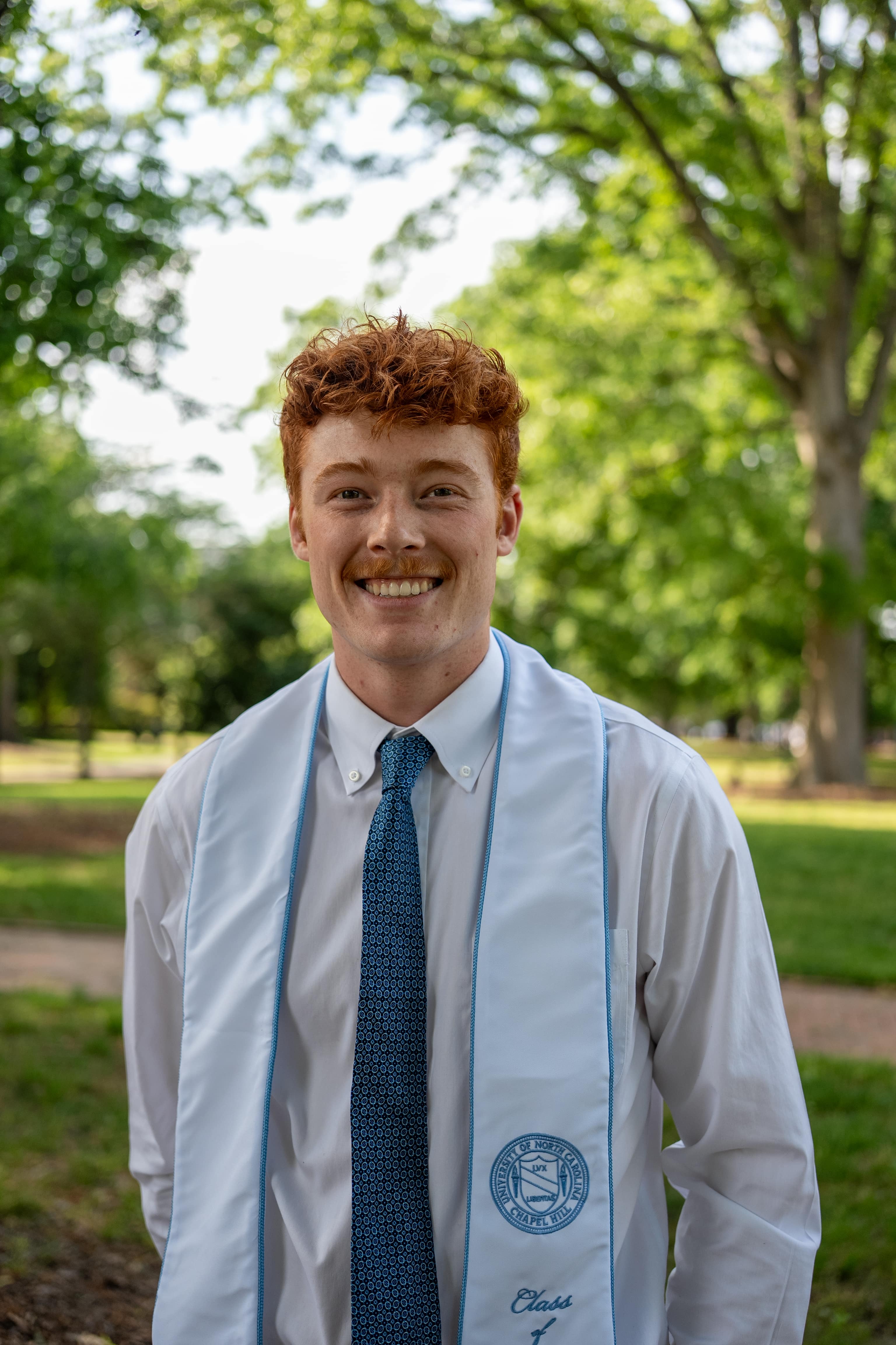 Hugh, UNC Graduate, portrait by architecture
