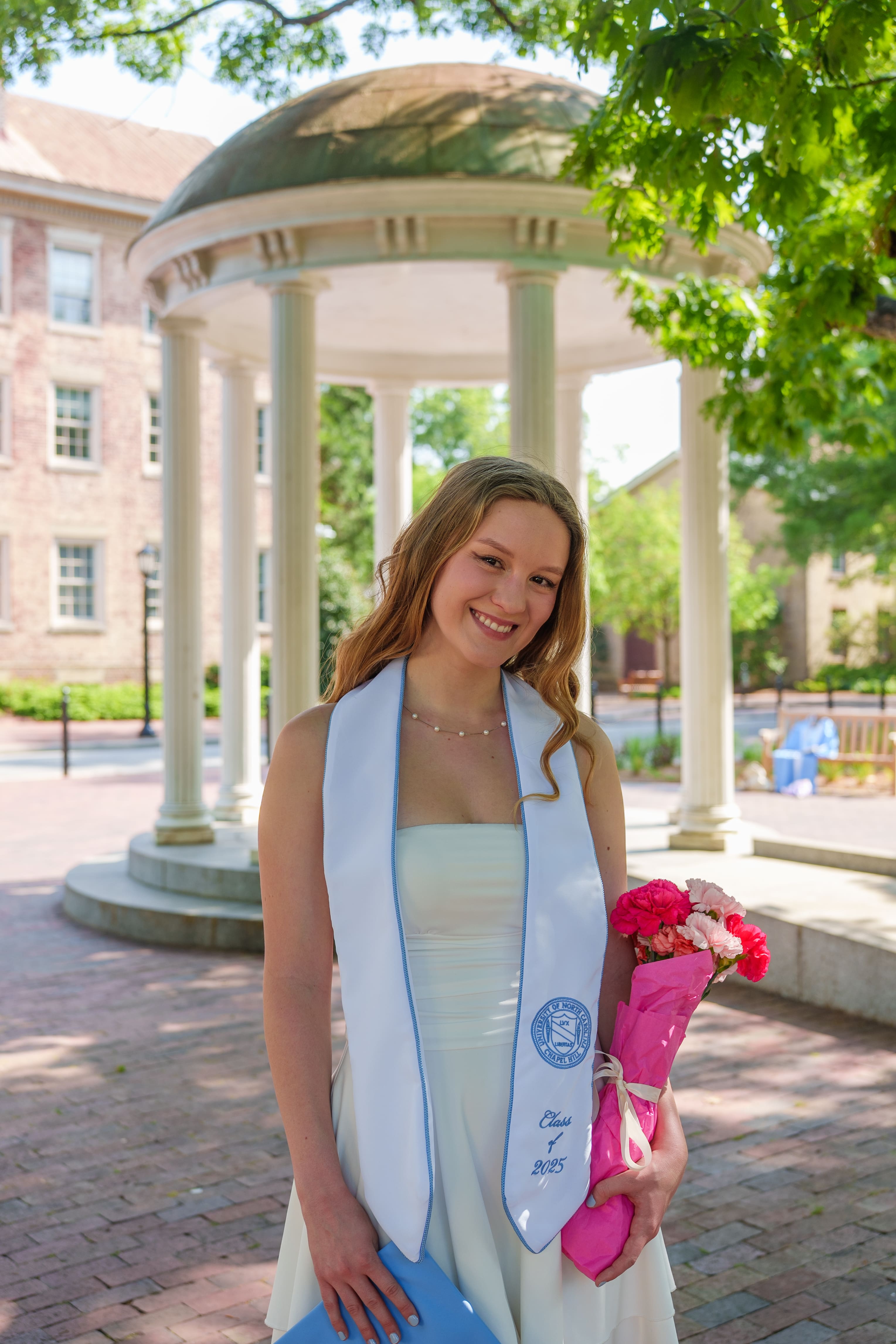 Lauren, UNC Graduate, smiling portrait